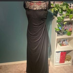 13. Xscape Beautiful black dress